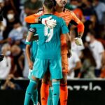 Valencia vs Real Madrid: Cortuis and Benzema celebrating after victory