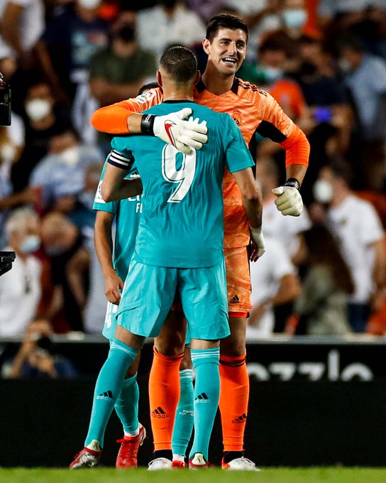 Valencia vs Real Madrid: Cortuis and Benzema celebrating after victory