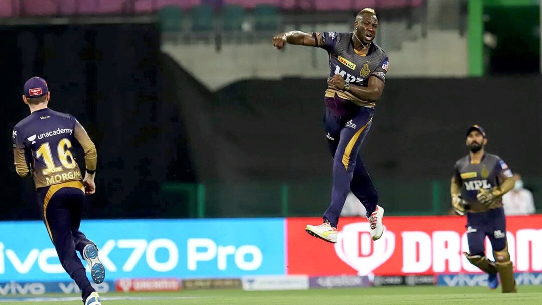 IPL 2021: KKR vs RCB. Russell celebrates after getting AB's wicket