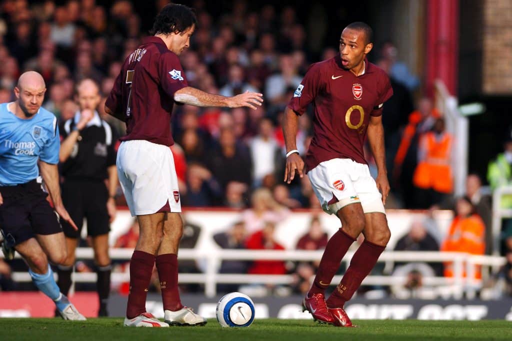Tottenham: Arsenal’s Robert Pires tries to pass the ball to Thierry Henry from the penalty spot (Photo by Jon Buckle – PA Images via Getty Images)