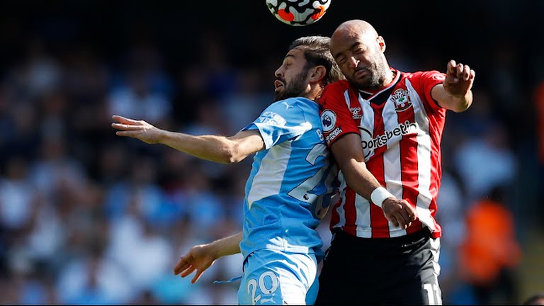 City's Silva and Southampton's Redmond in action.